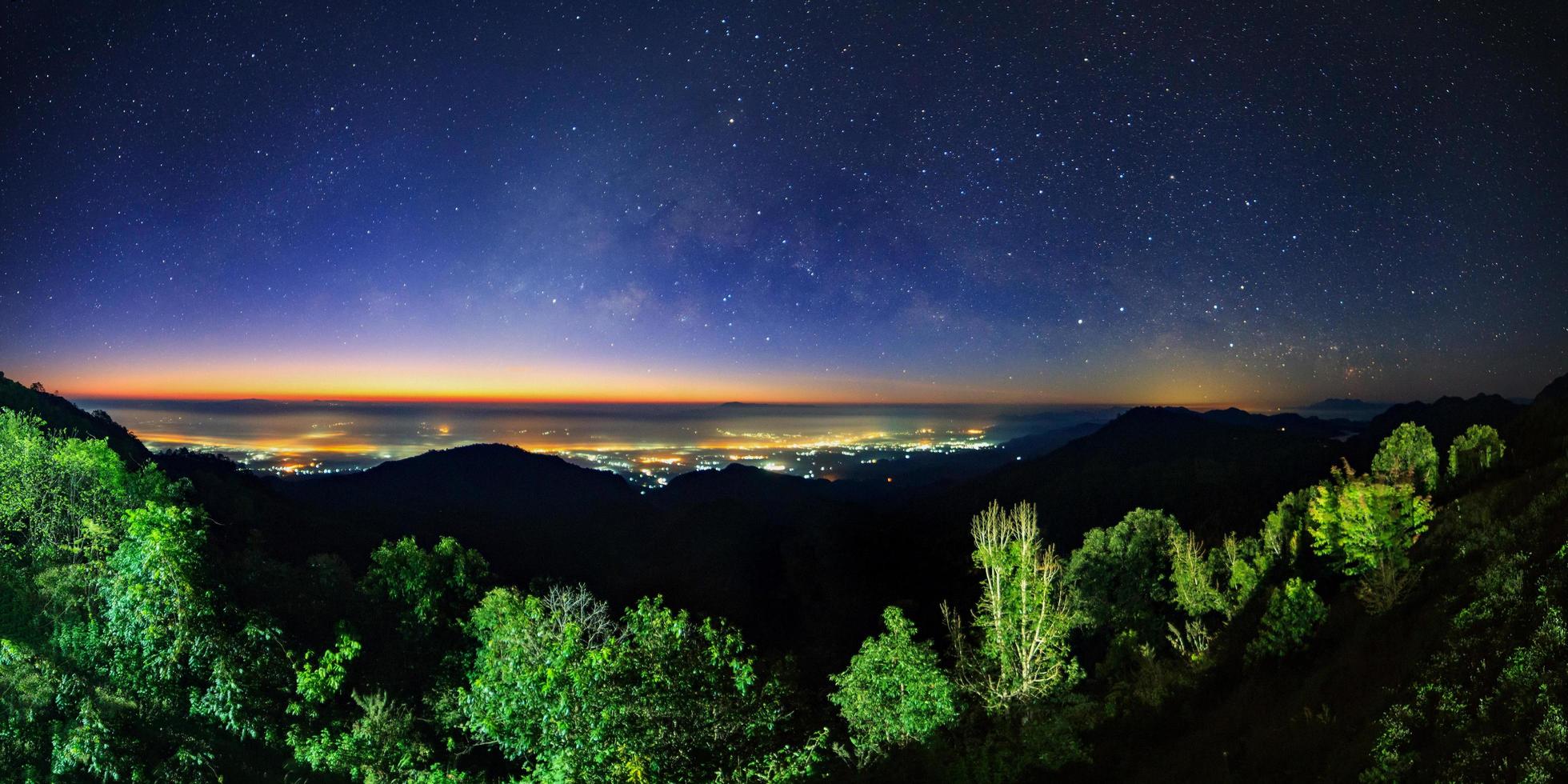 Starry night sky at Monson viewpoint Doi AngKhang and milky way galaxy with stars and space dust in the universe photo