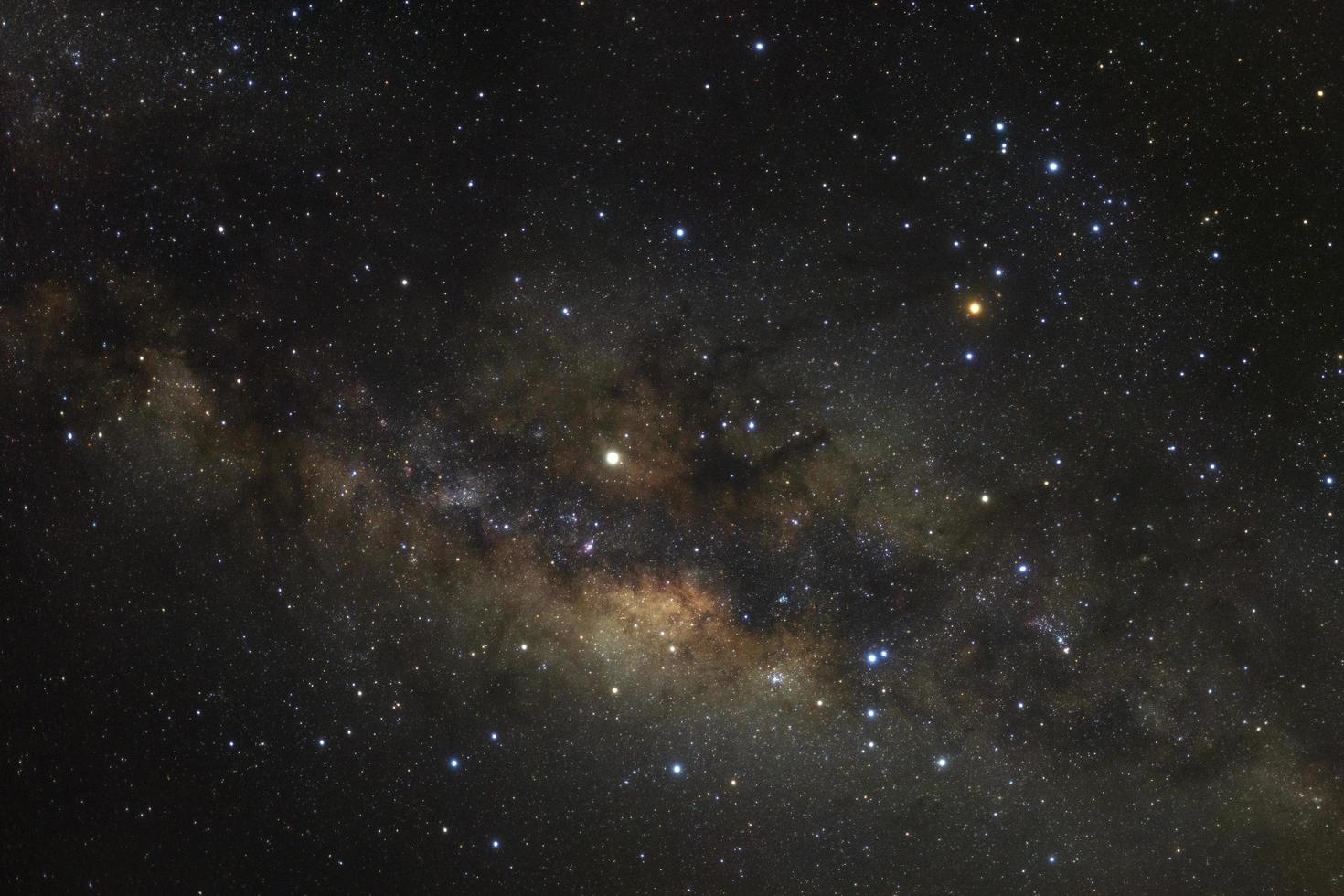 Milky way galaxy with stars and space dust in the universe, Long exposure photograph, with grain. photo