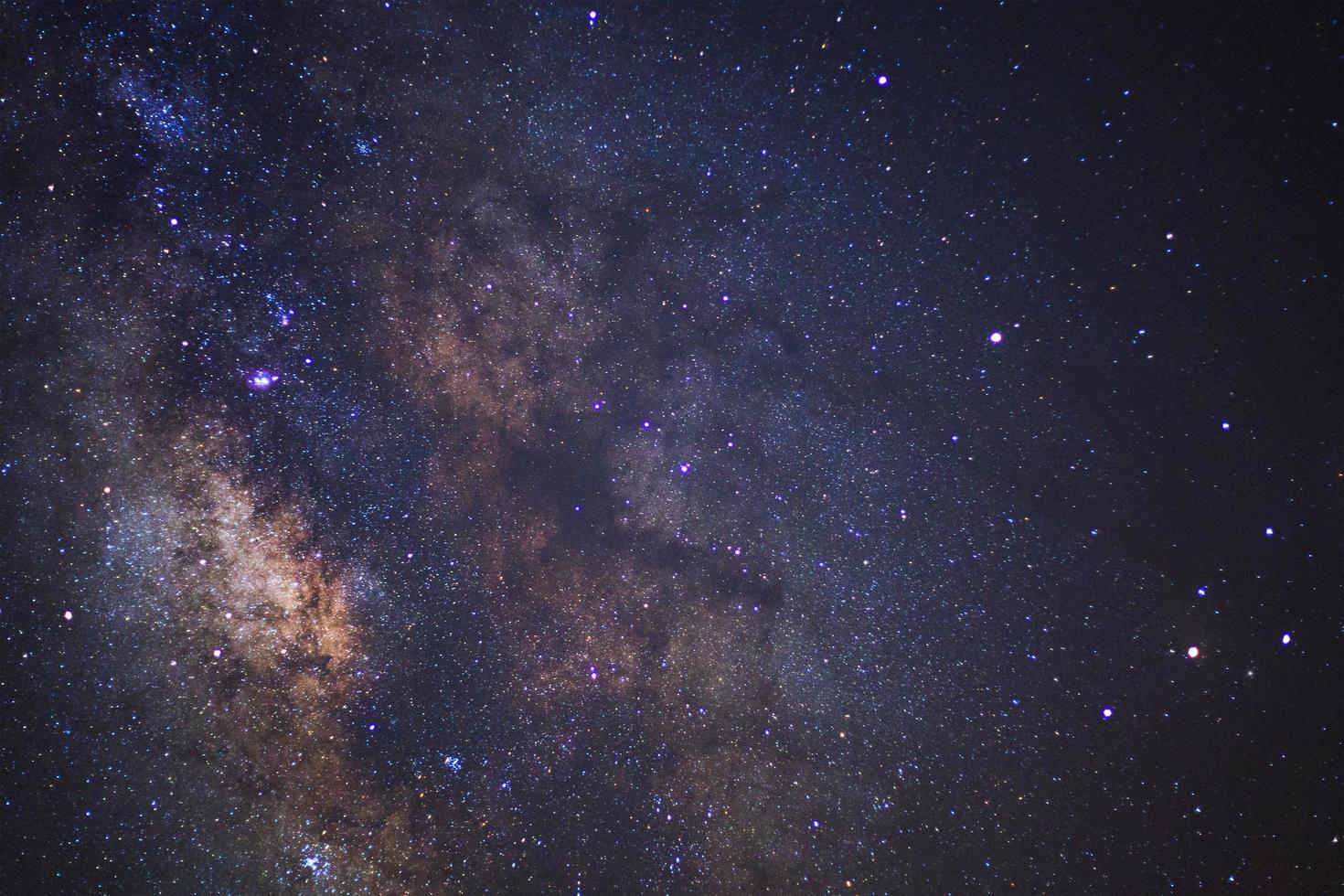 Starry night sky and milky way galaxy with stars and space dust in the universe photo