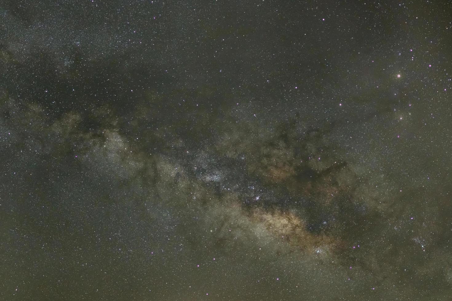 Milky way galaxy with stars and space dust in the universe, Long exposure photograph, with grain. photo