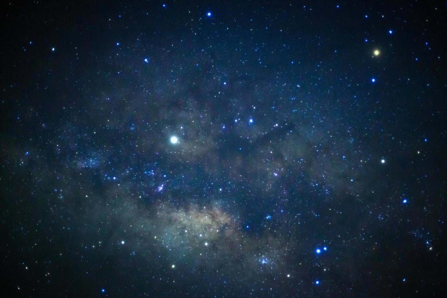 Close-up of Milky way galaxy with stars and space dust in the universe, Long exposure photograph, with grain. photo