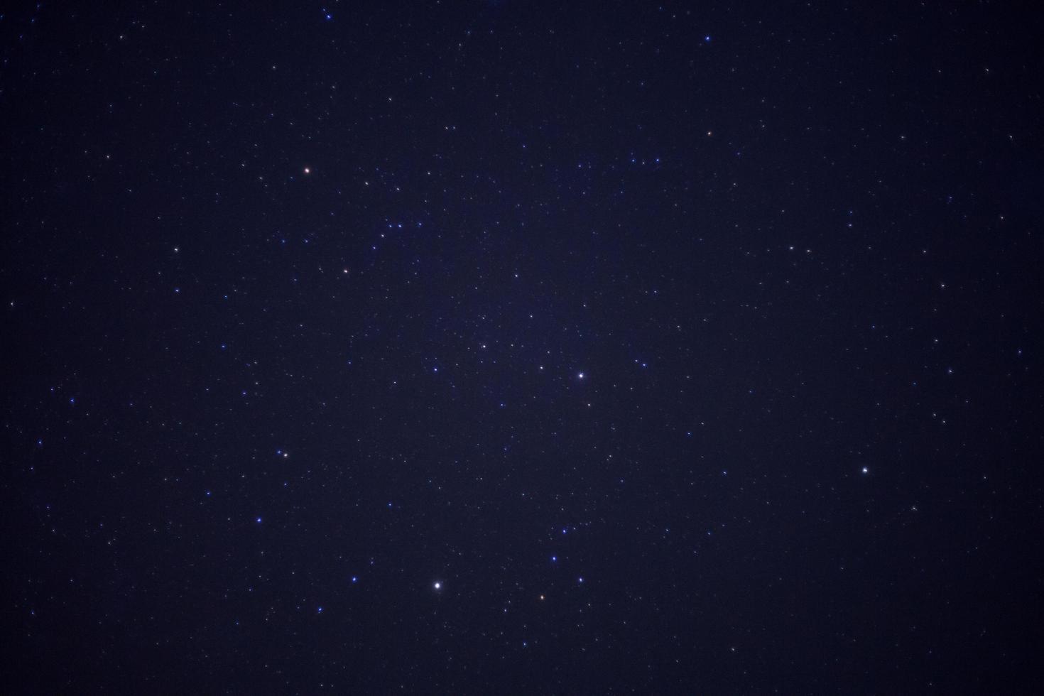 Starry night sky and milky way galaxy with stars and space dust in the universe photo