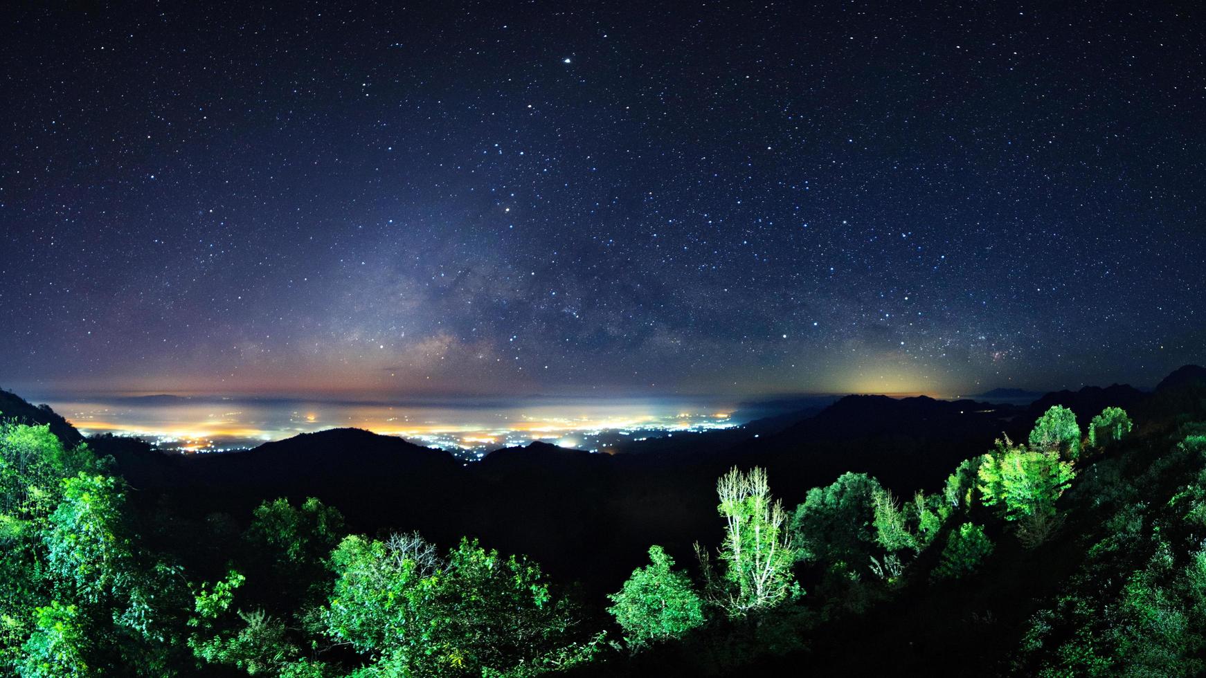 Starry night sky at Monson viewpoint Doi AngKhang and milky way galaxy with stars and space dust in the universe photo