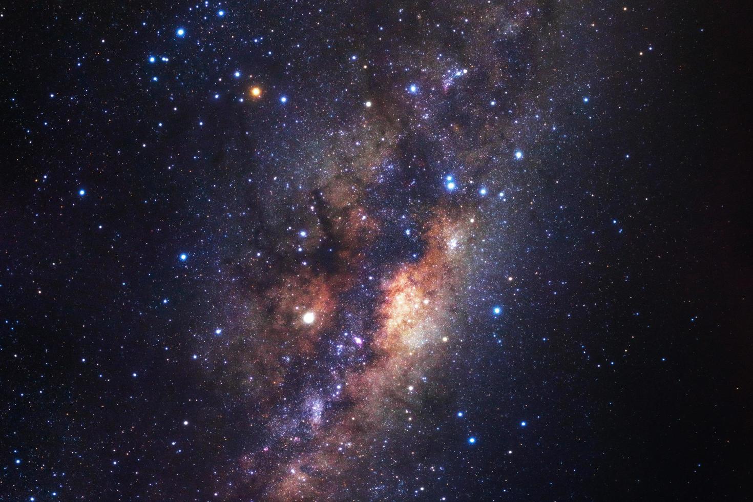 Milky way galaxy with stars and space dust in the universe, Long exposure photograph, with grain. photo