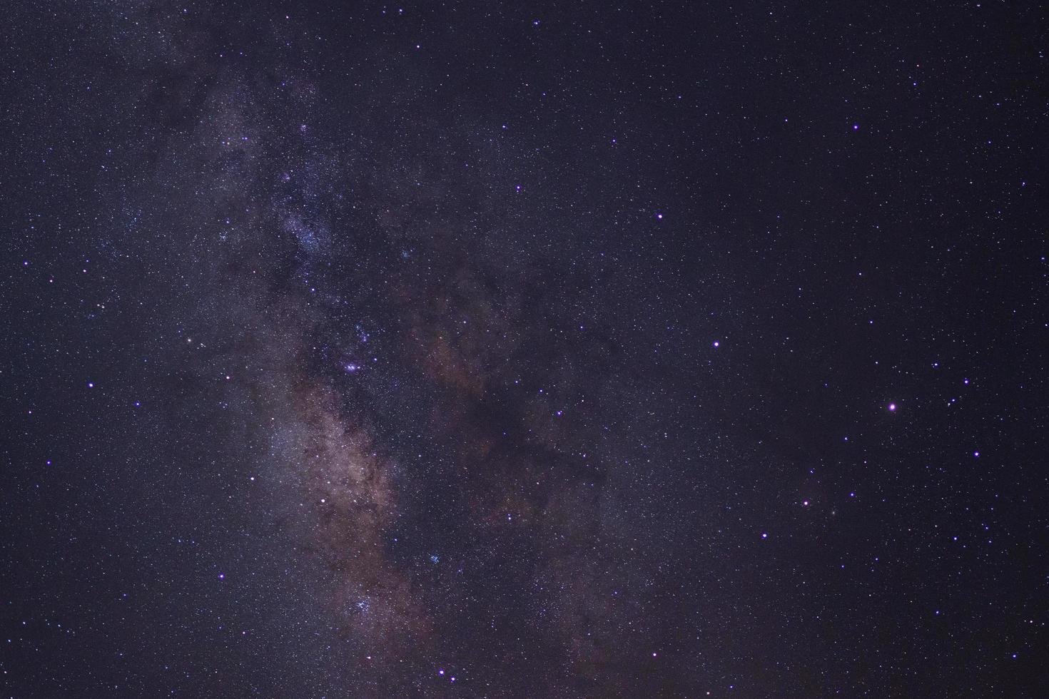 Starry night sky and milky way galaxy with stars and space dust in the universe photo
