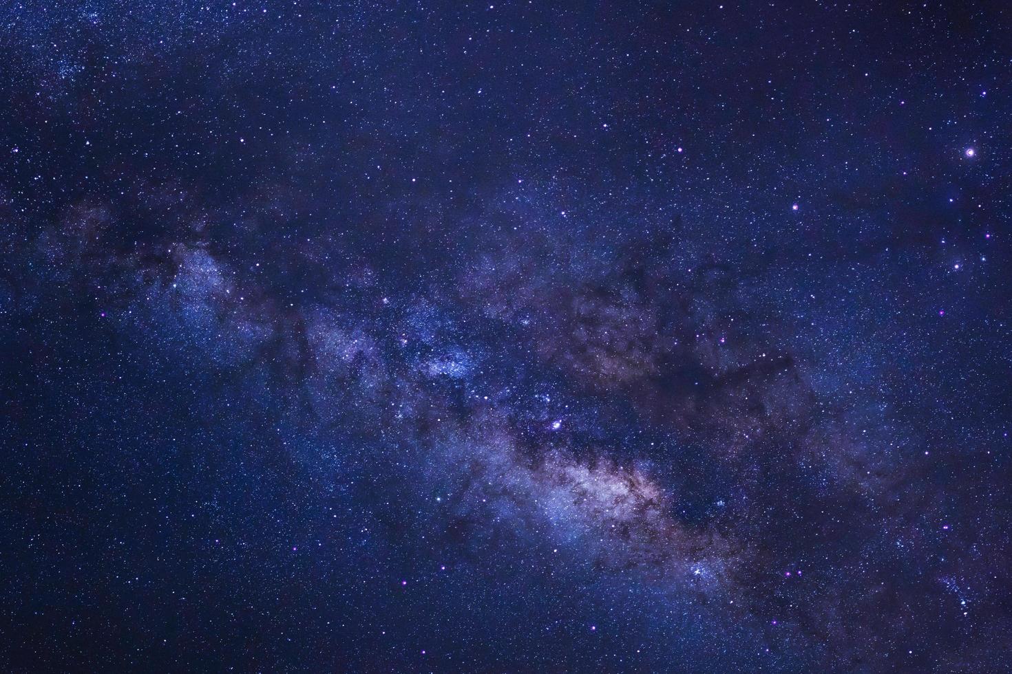 Starry night sky and milky way galaxy with stars and space dust in the universe photo