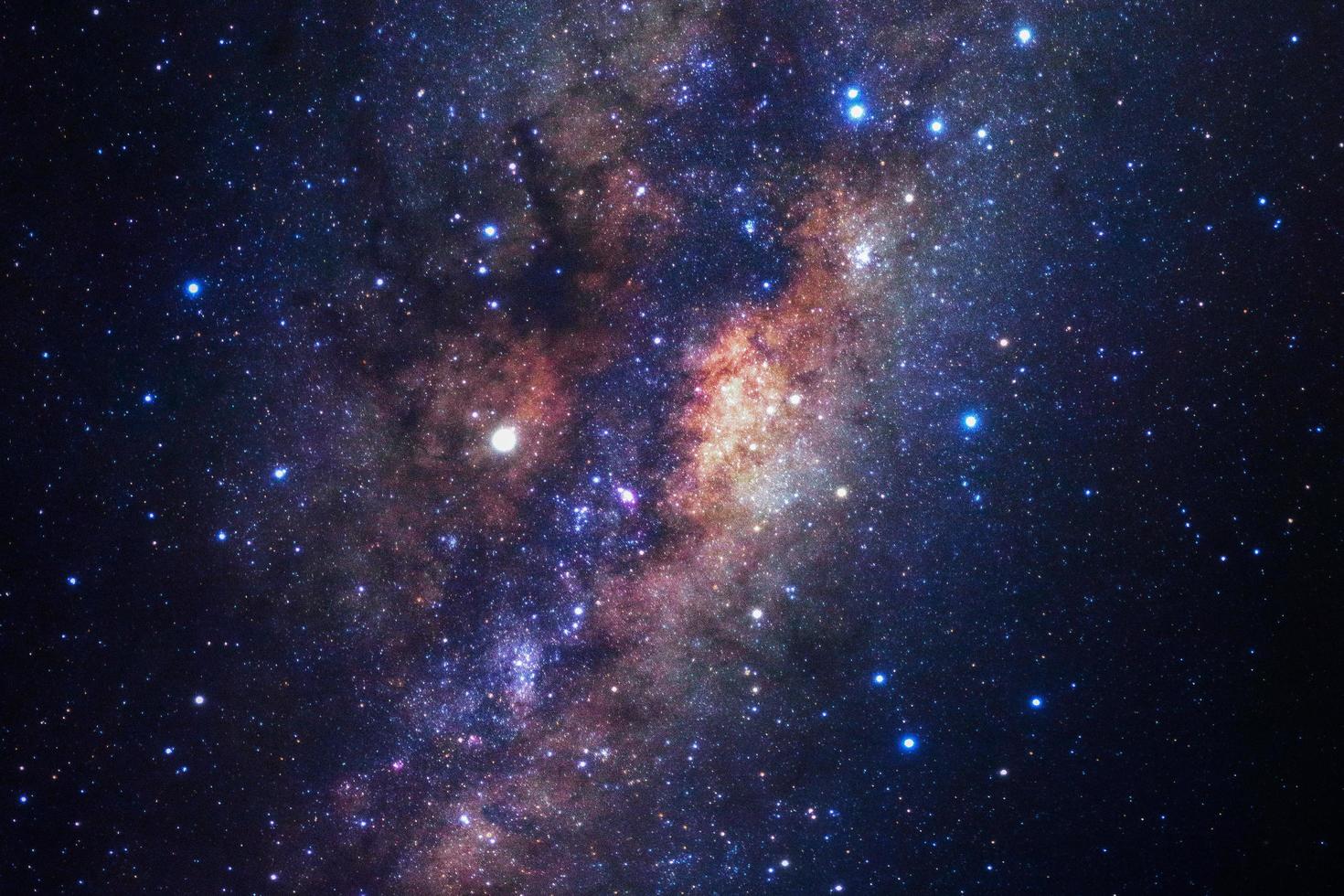 Milky way galaxy with stars and space dust in the universe, Long exposure photograph, with grain. photo