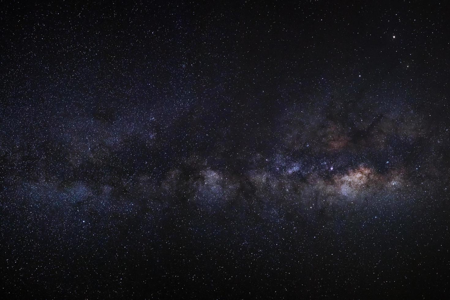 Milky way galaxy with stars and space dust in the universe, Long exposure photograph, with grain. photo