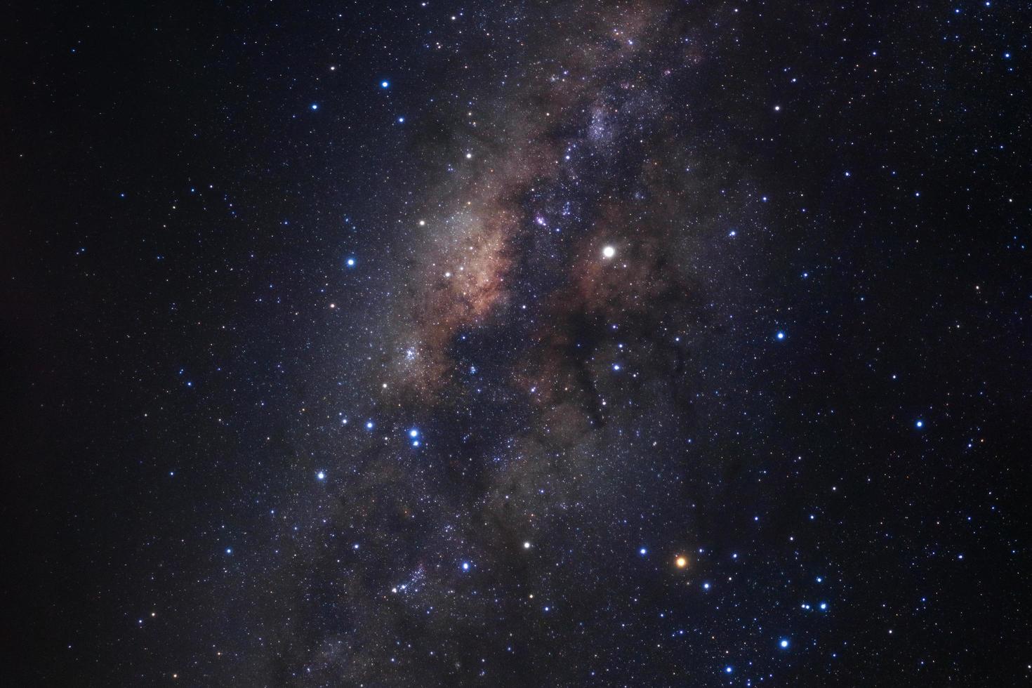 Milky way galaxy with stars and space dust in the universe, Long exposure photograph, with grain. photo