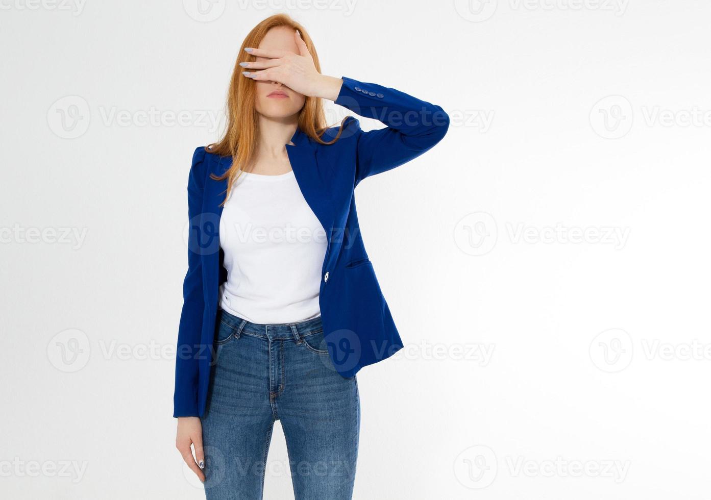 Cute, young beautiful red hair woman do facepalm. Redhead suffer girl headache failed to upset business face palm. Portrait of female doing facepalm posing against studio background. photo