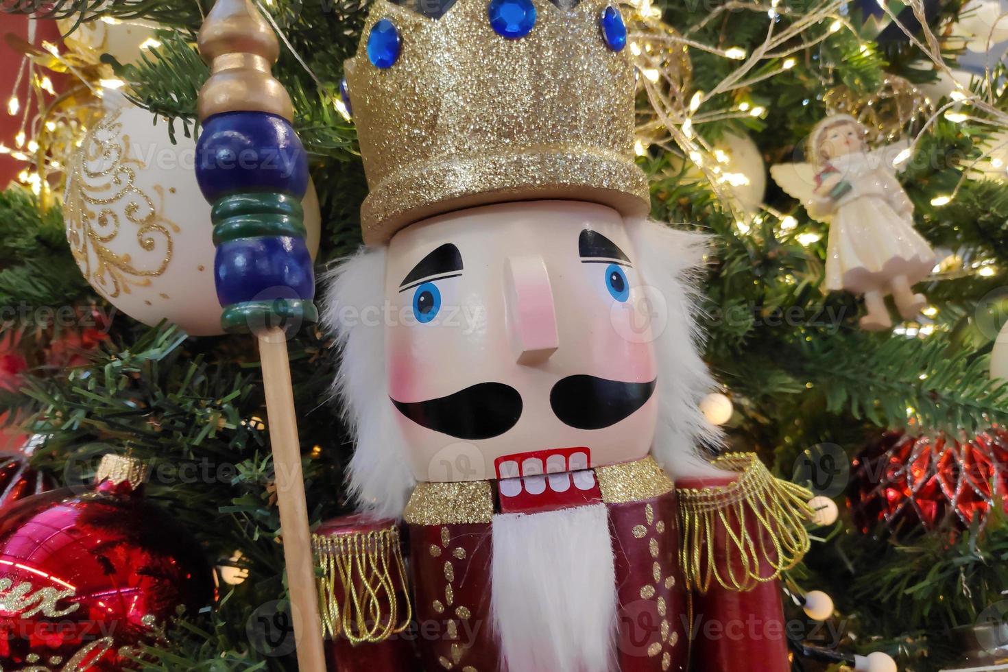 Nutcracker in a christmas tree photo