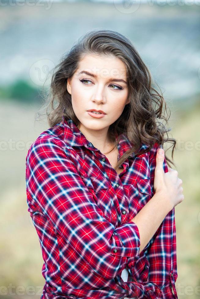 Hipster woman relaxing in nature. Beautiful white girl. photo
