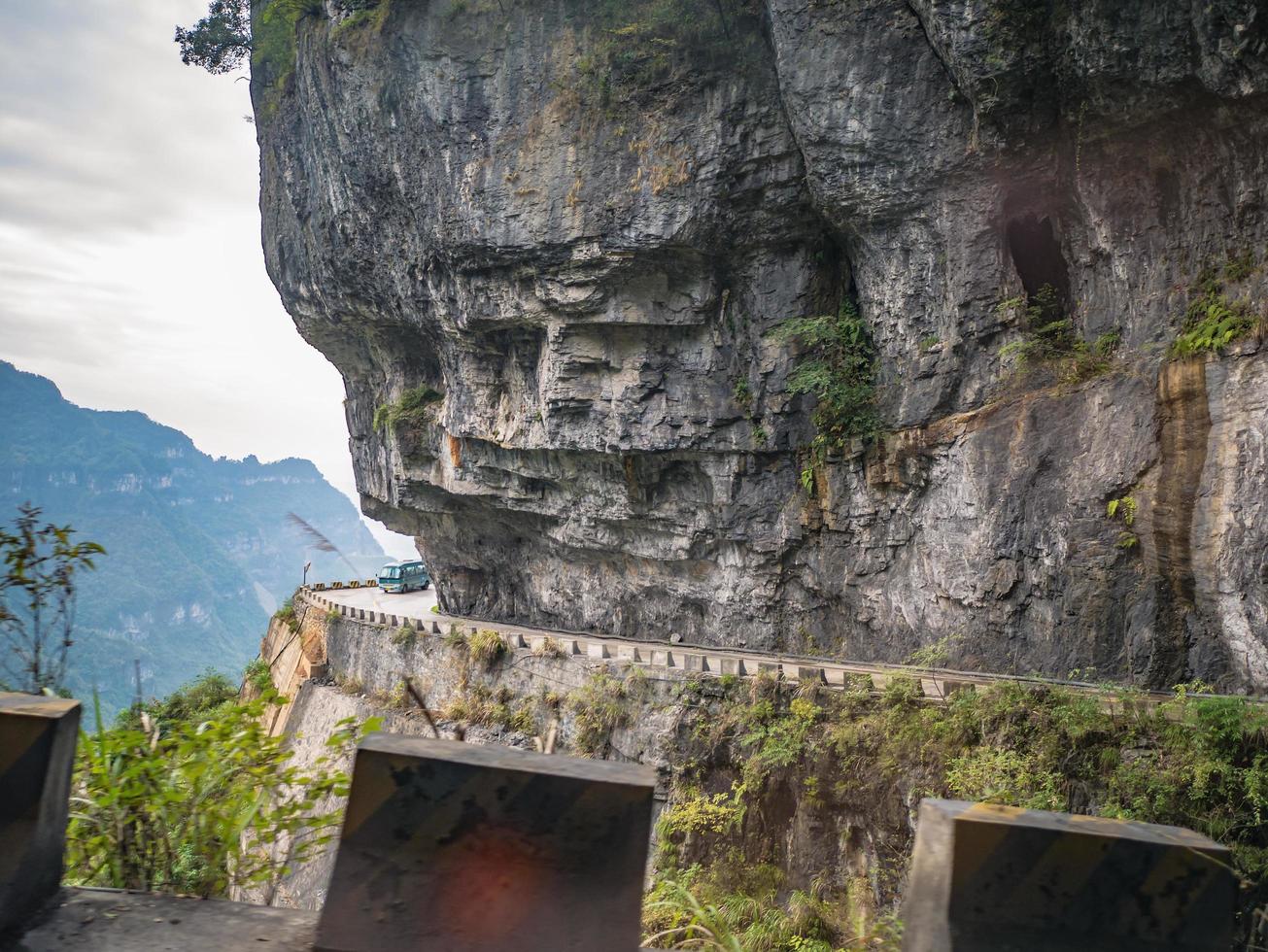 Beautiful view on the bus on tongtian road moving from tianmen mountain heaven gate cave on tianmen mountain national park at zhangjiajie city China.Tongtian Road the winding Road  99  curves road photo