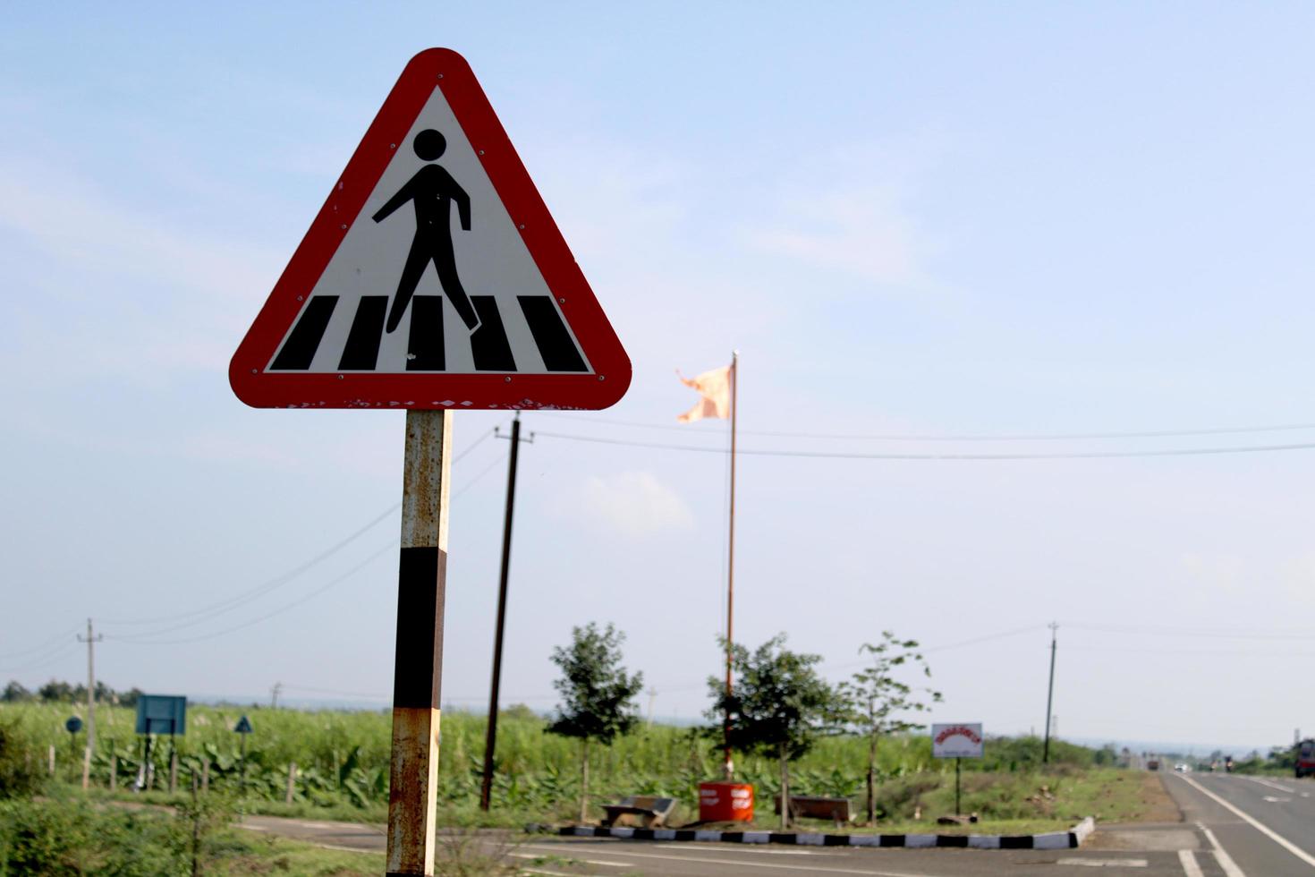 Vijayapura, Karnataka, November 26, 2021 - Pedestrian Crossing Sign Board on National Highway 218. photo