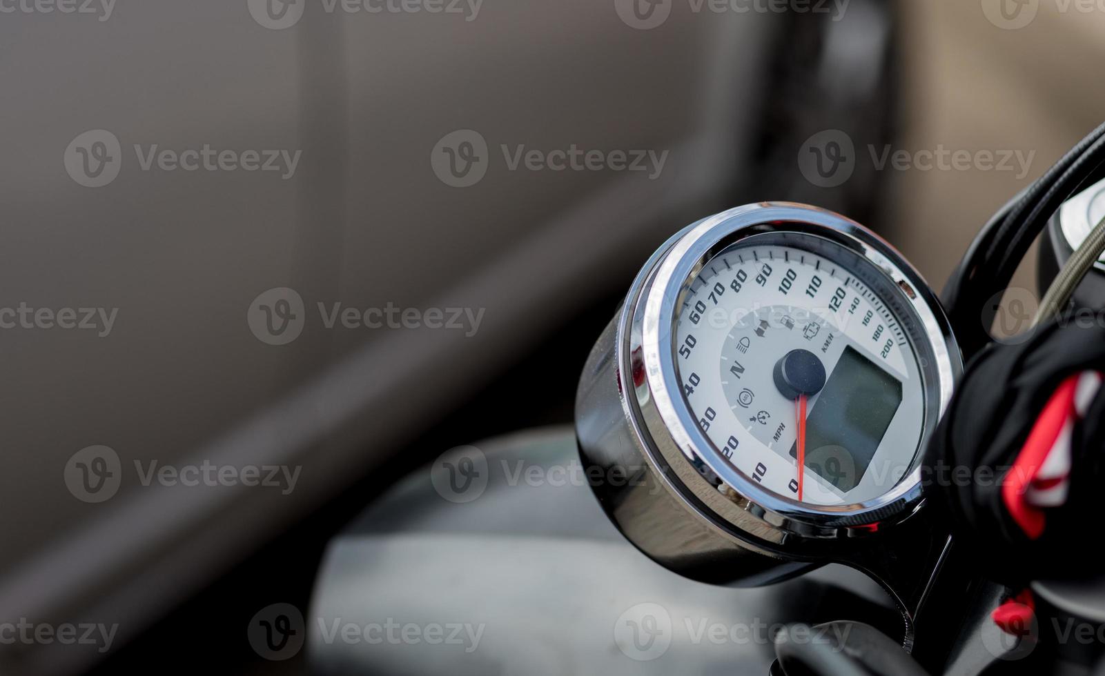 chromed motorcycle speedometer. photo