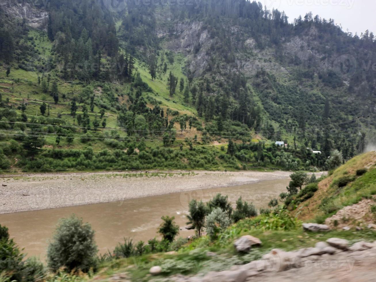 Kashmir is the most beautiful region in the world which is famous for its green valleys, beautiful trees, high mountains and flowing springs. photo