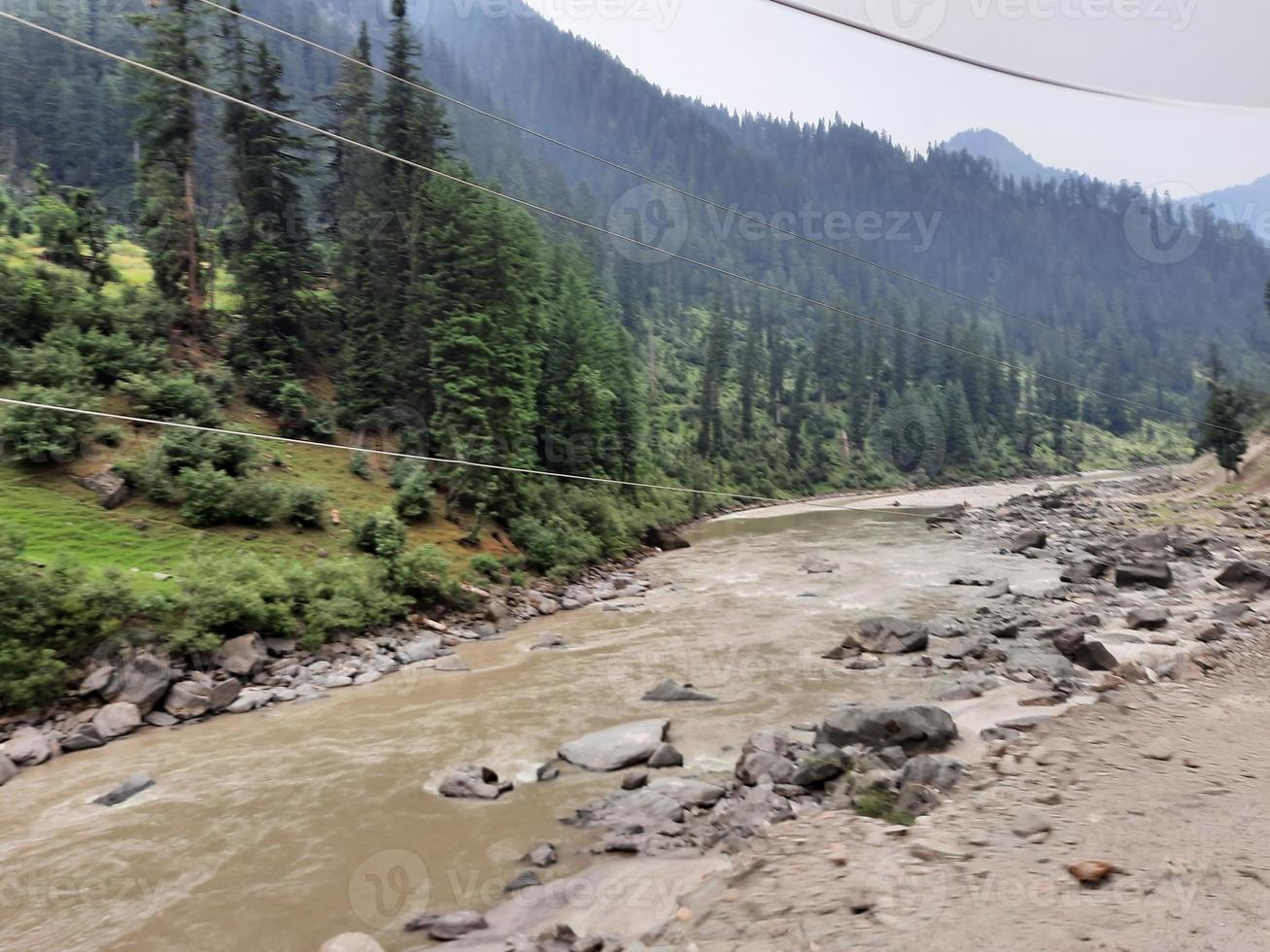 Kashmir is the most beautiful region in the world which is famous for its green valleys, beautiful trees, high mountains and flowing springs. photo