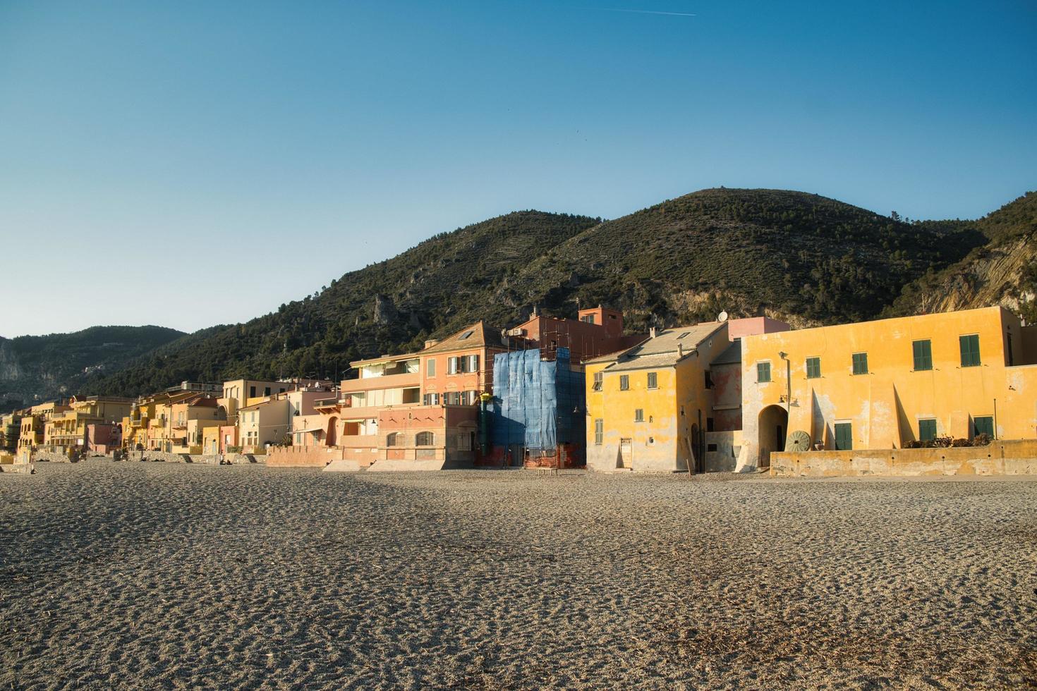 the beautiful Etruscan village of varigotti, with its yellow houses and its typical alleys photo