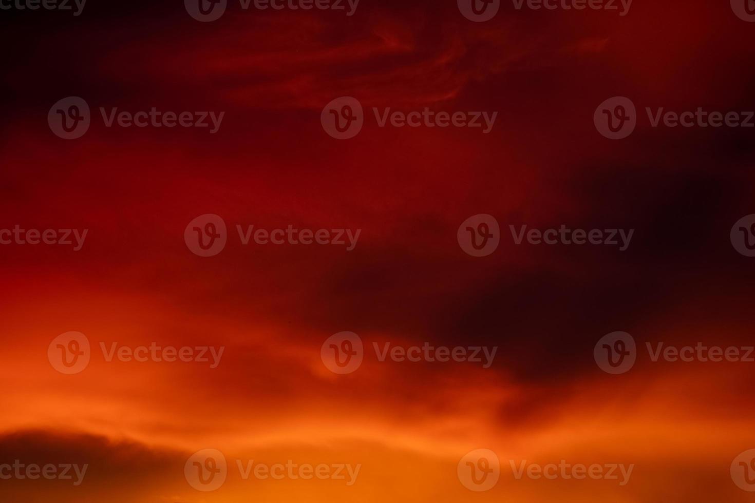 Beautiful burred gradiant orange clouds and sunlight on the blue sky perfect for the background, take in everning,Twilight, rainy season,winter, summer photo