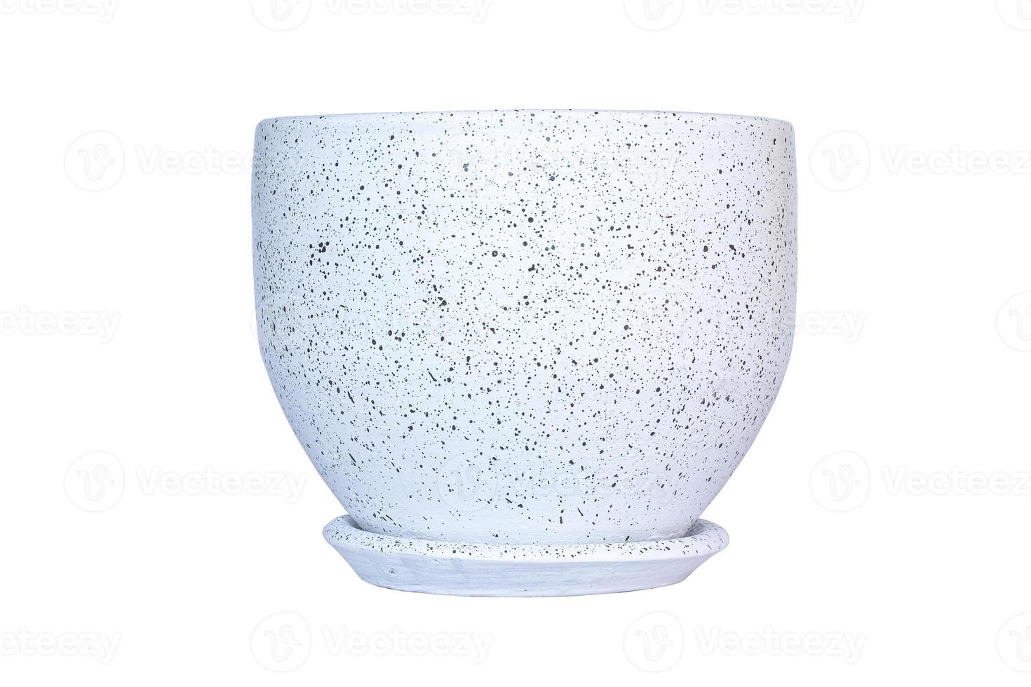 Modern white polka dot flower pot with saucer isolated on white background with clipping path photo