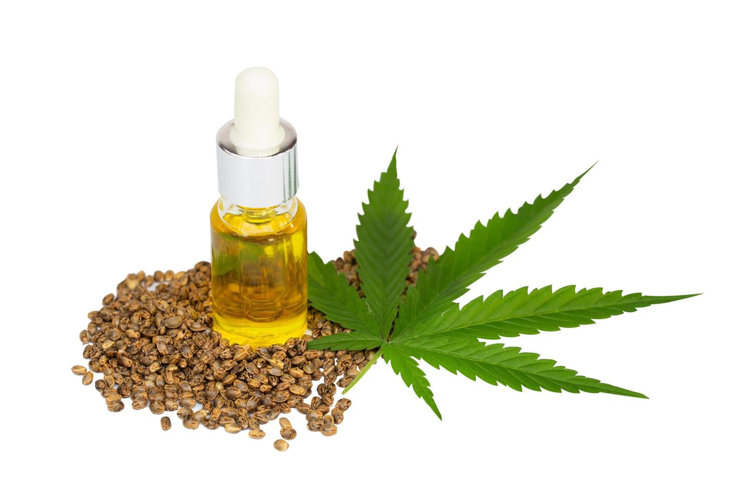 CBD cannabis oil. Hemp oil and  hemp seed isolated on white background. Healthy cannabis oil. photo