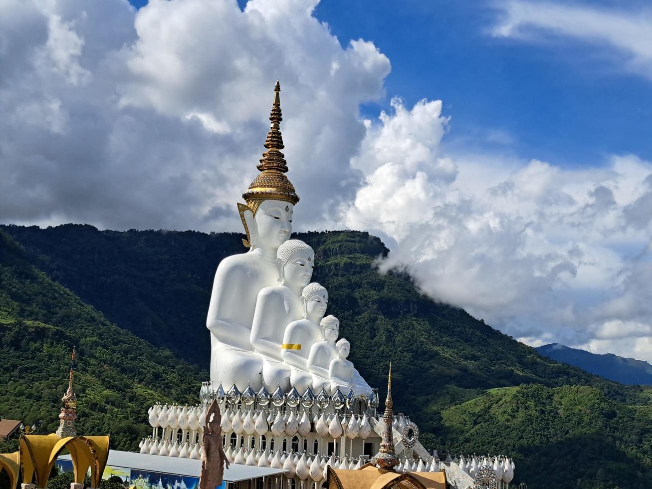 Kao kho, Phetchabun, Thailand, 2022 - Buddha statues in front of mountain and sky photo