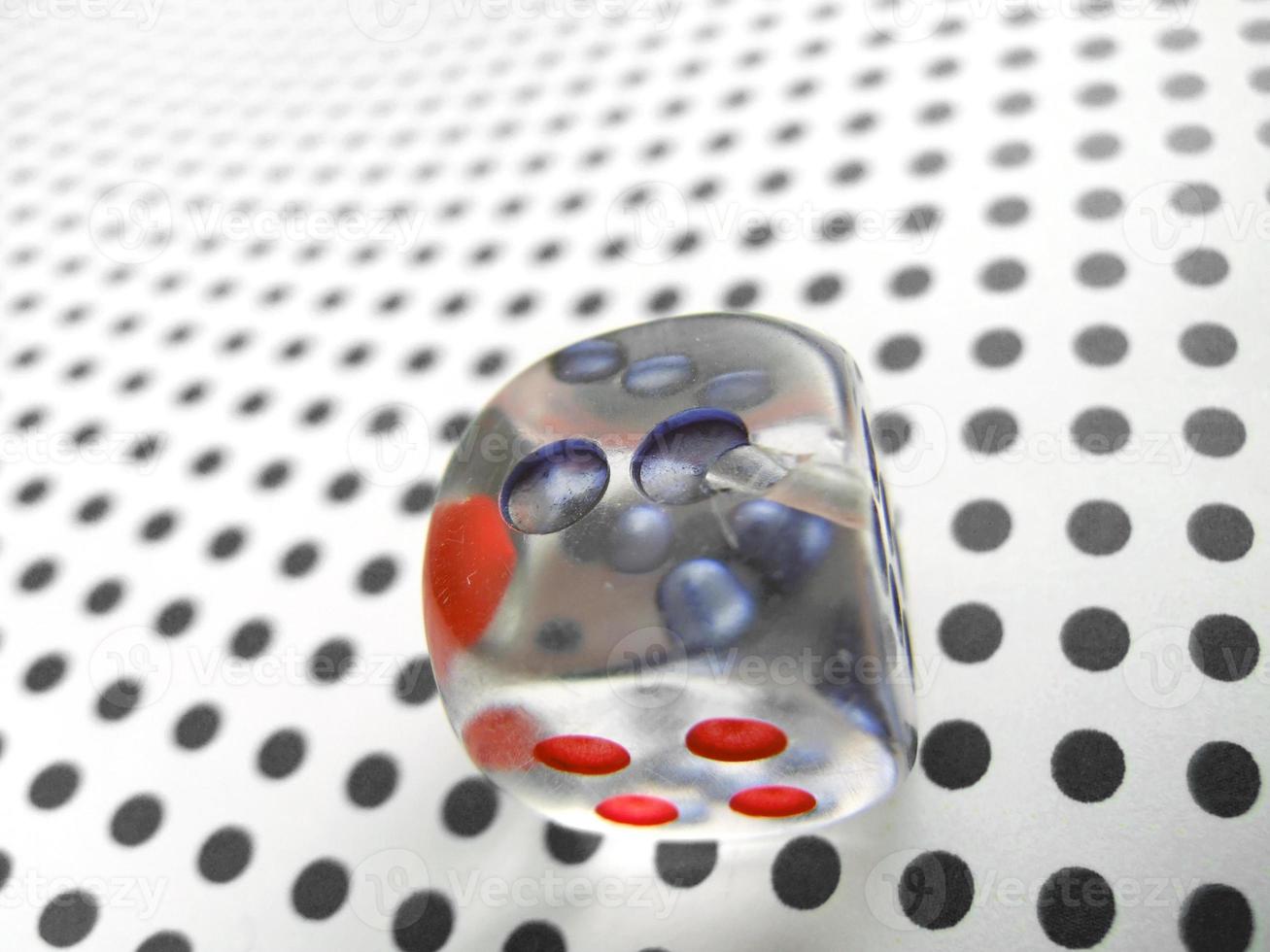 Dice on dotted background photo