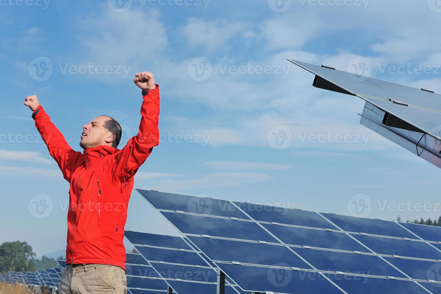 Male solar panel engineer at work place photo