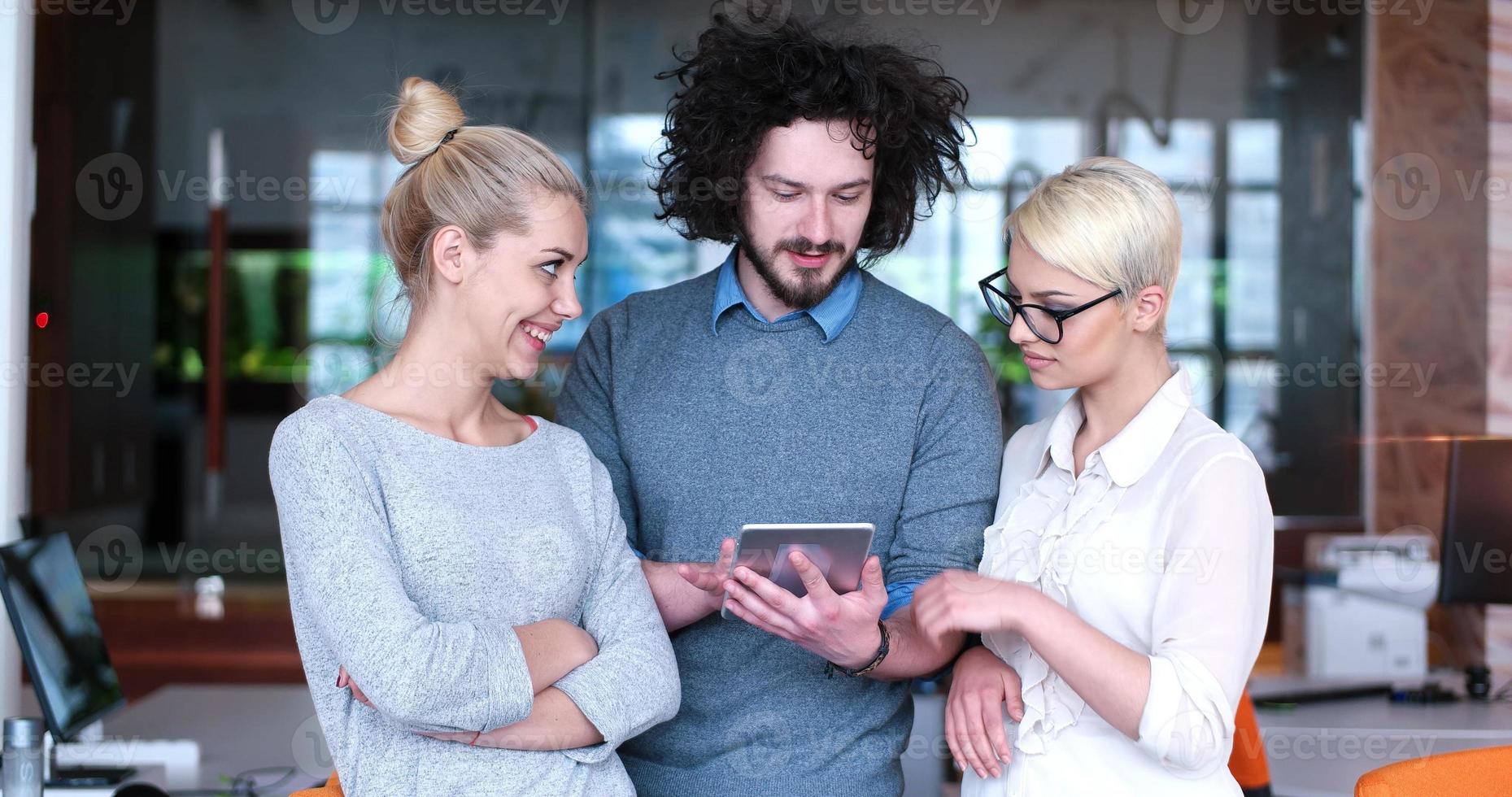 Startup Business Team At A Meeting at modern office building photo
