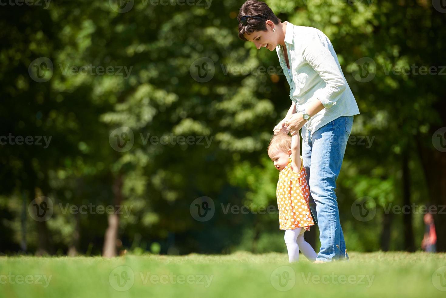 mother and baby in park photo