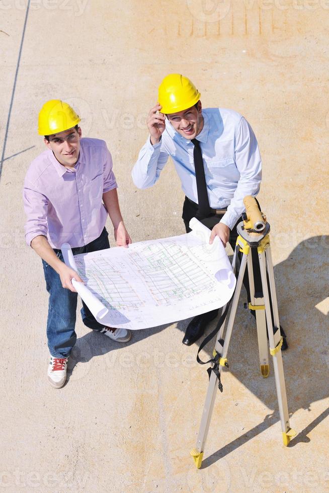 Team of architects on construciton site photo