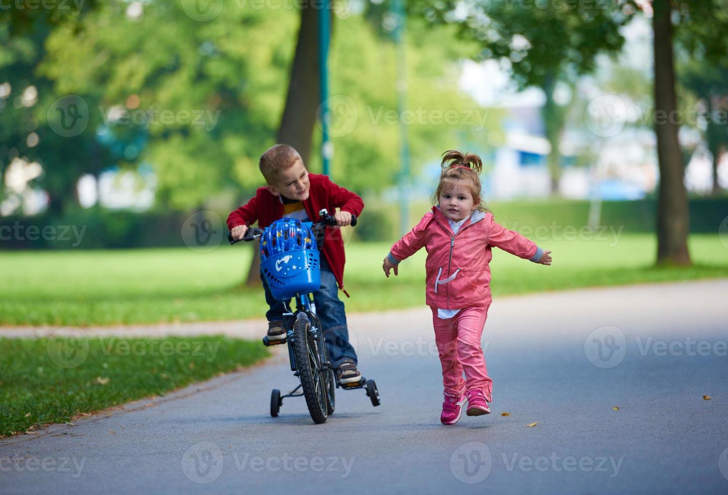boy and girl with bicycle photo