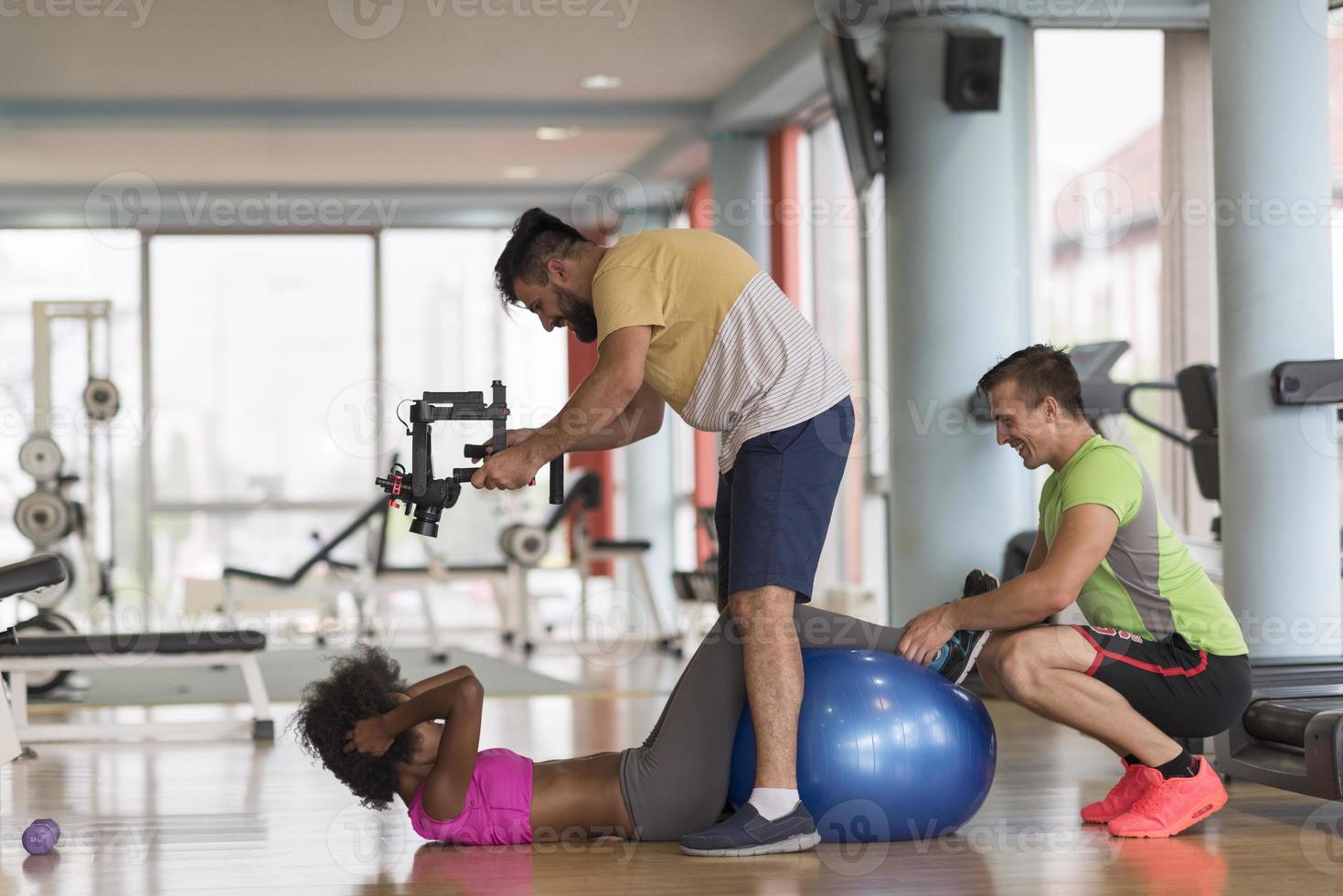 pilates  workout with personal trainer at gym photo