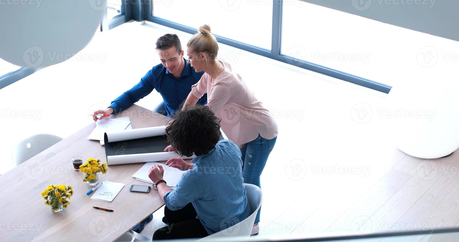 Startup Business Team At A Meeting at modern office building photo