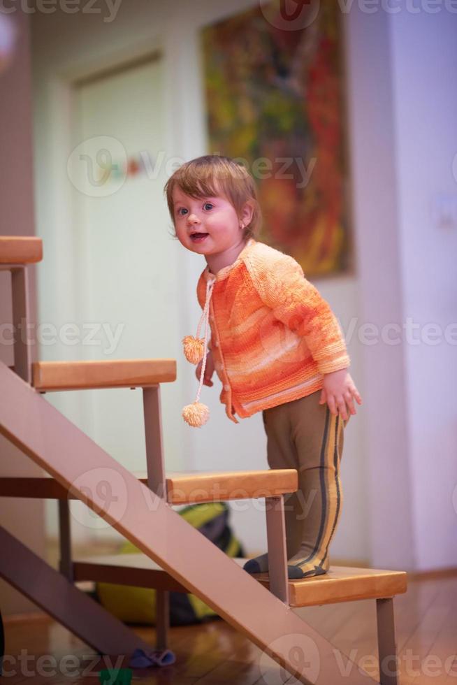 child playing with toys  at home photo