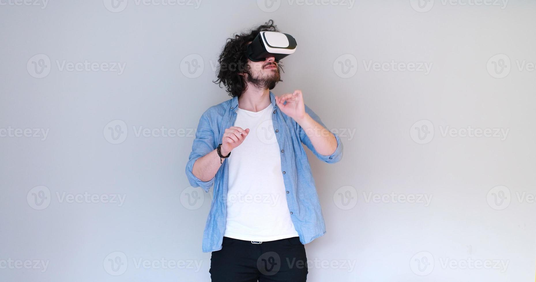 Man using headset of virtual reality photo