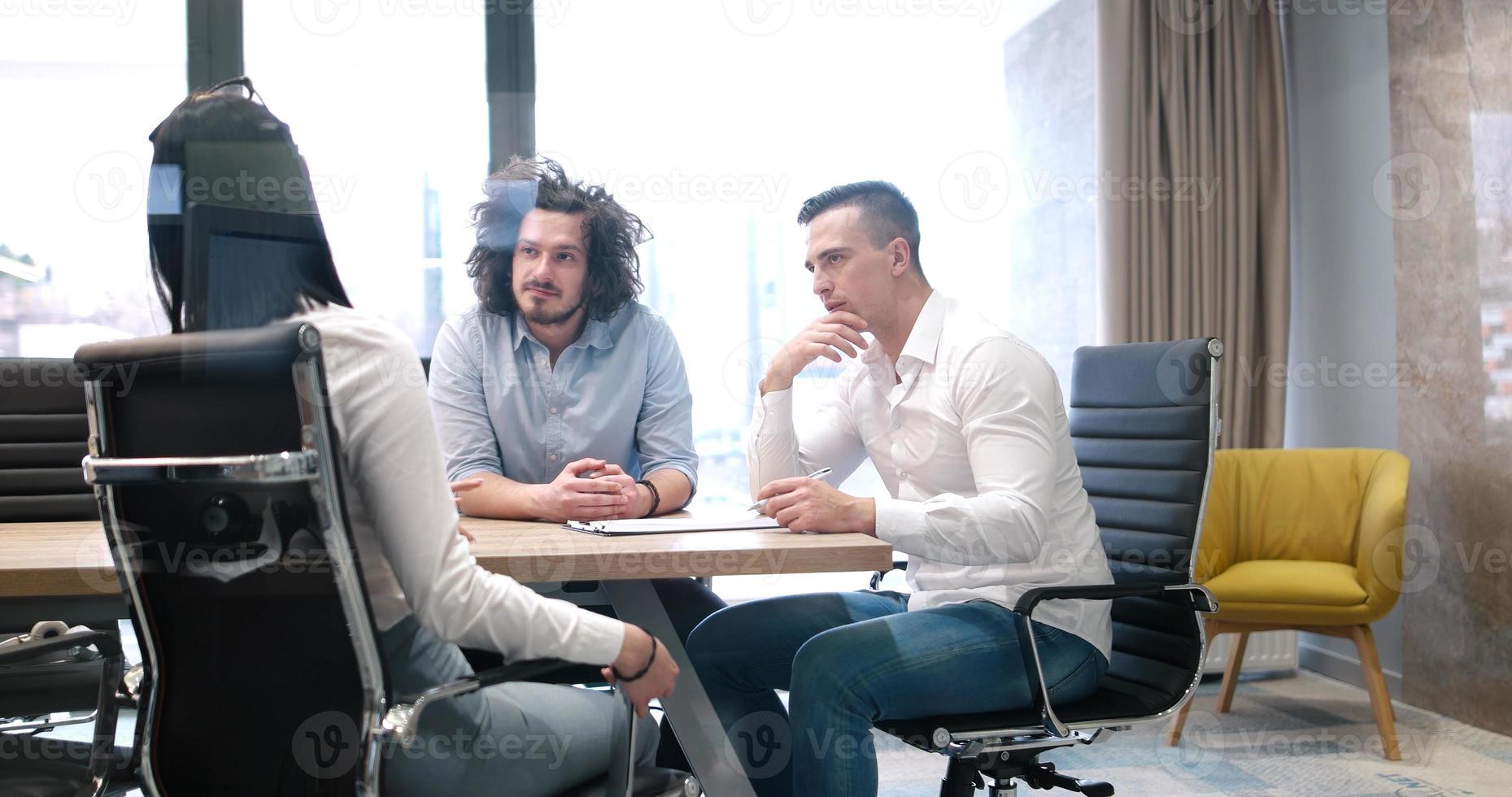 Startup Business Team At A Meeting at modern office building photo