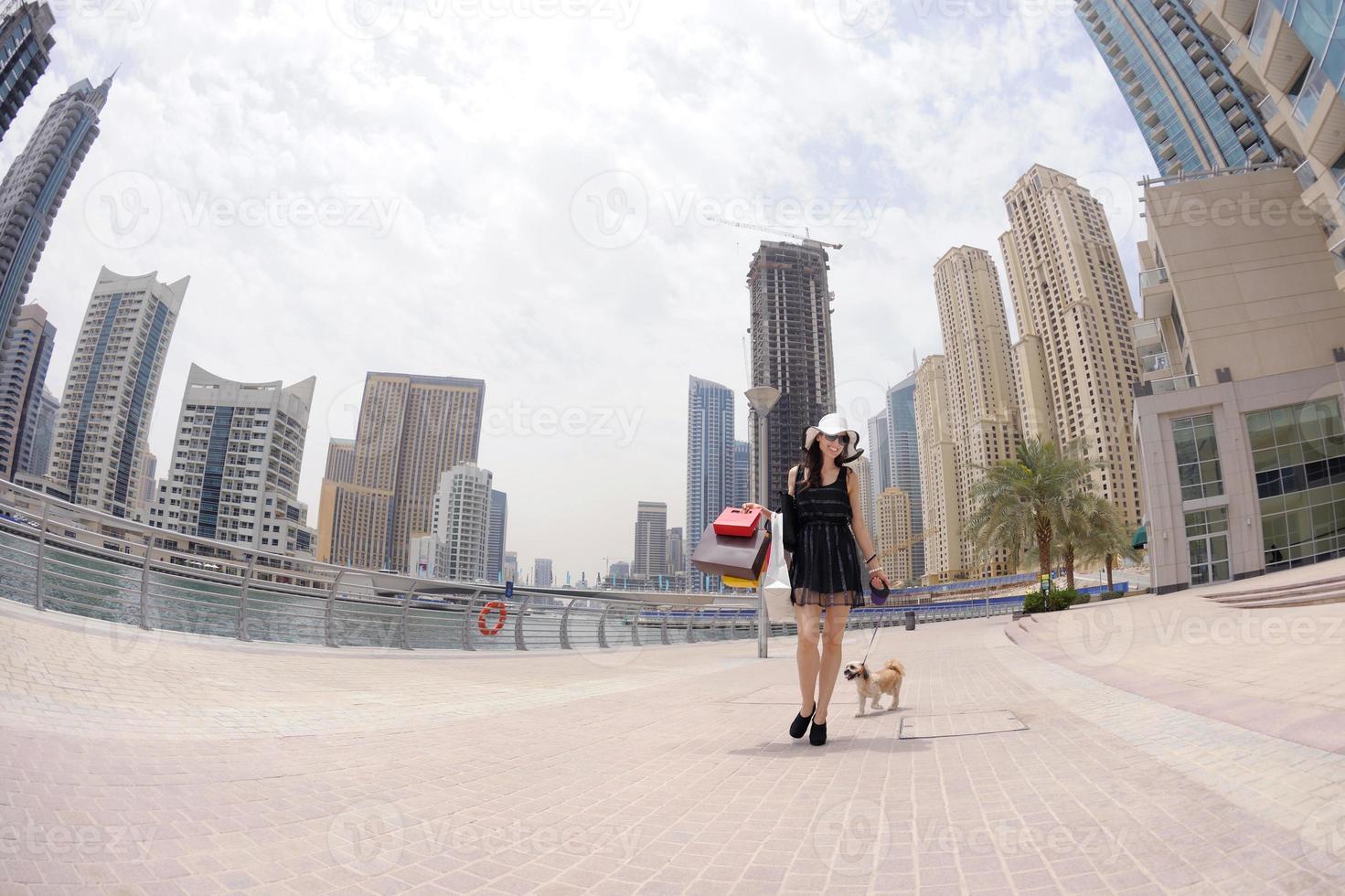 beautiful woman goes in shopping photo