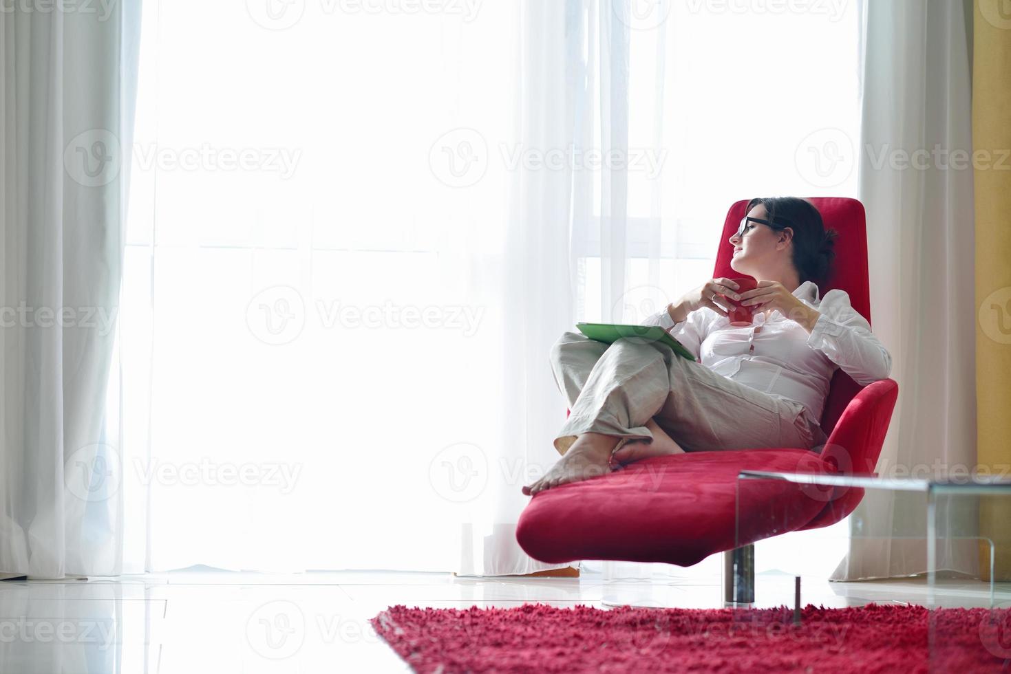 woman using tablet pc at home photo