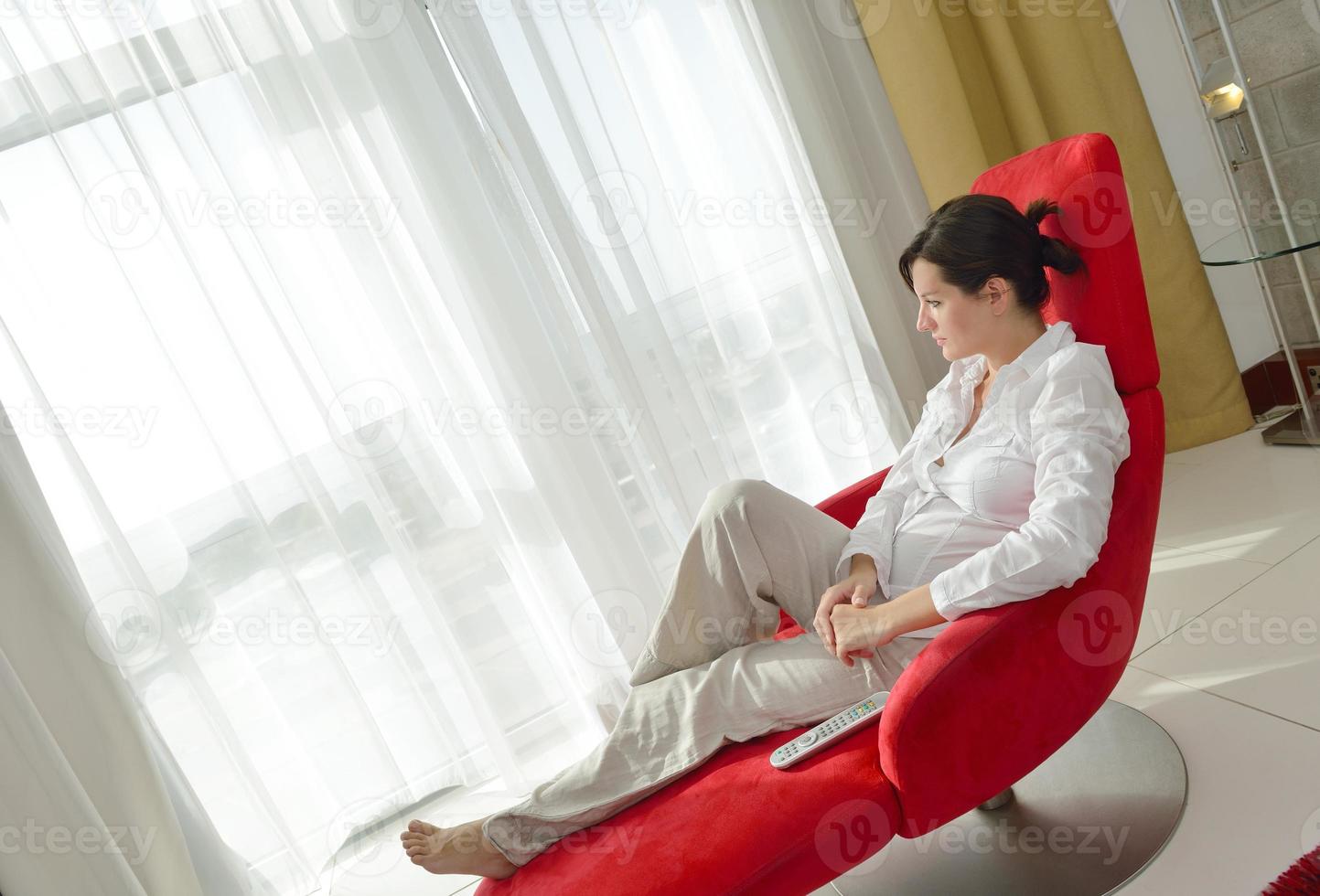 happy young woman relax at home on sofa photo