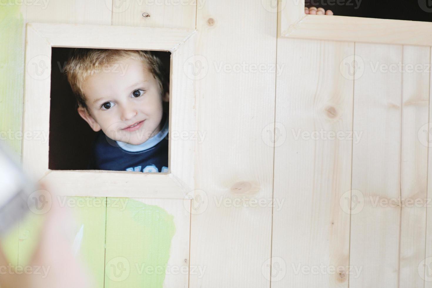 happy child in a window photo