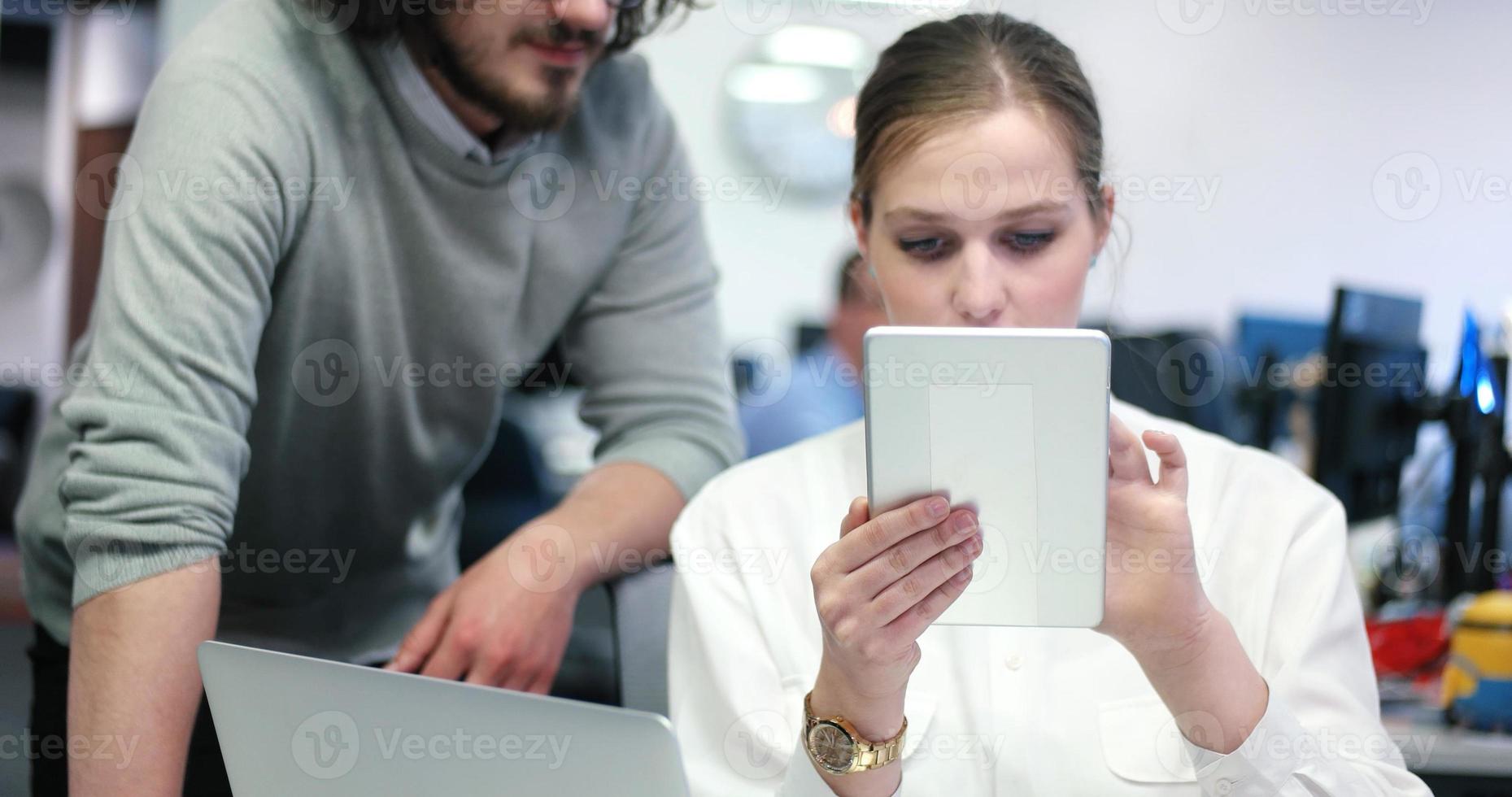 Startup Business Team At A Meeting at modern office building photo