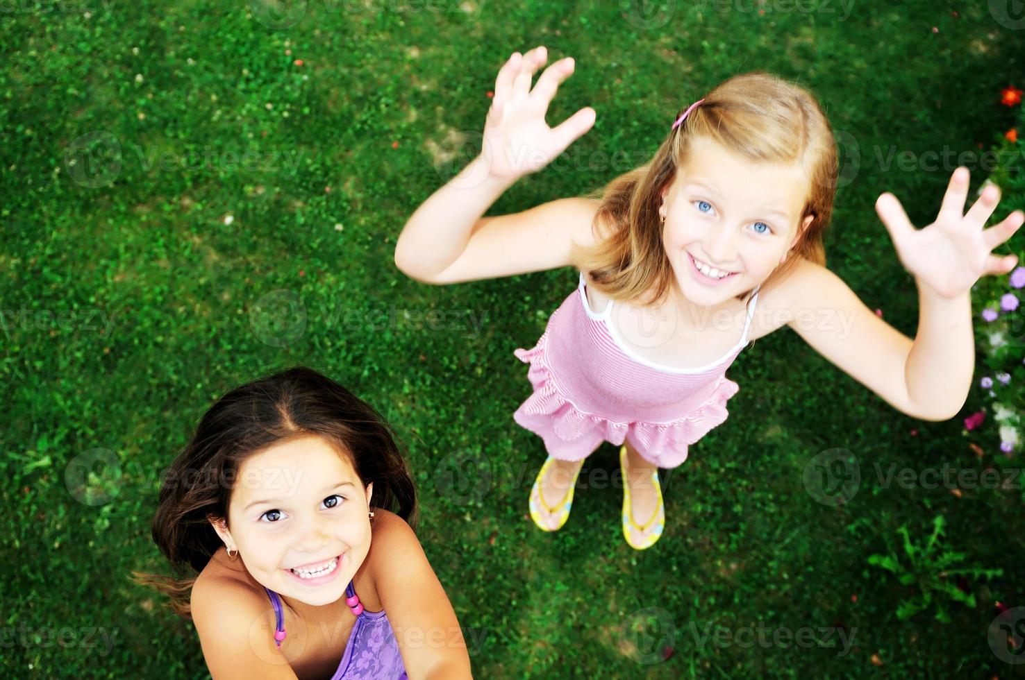 two happy girls have fun outdoor photo