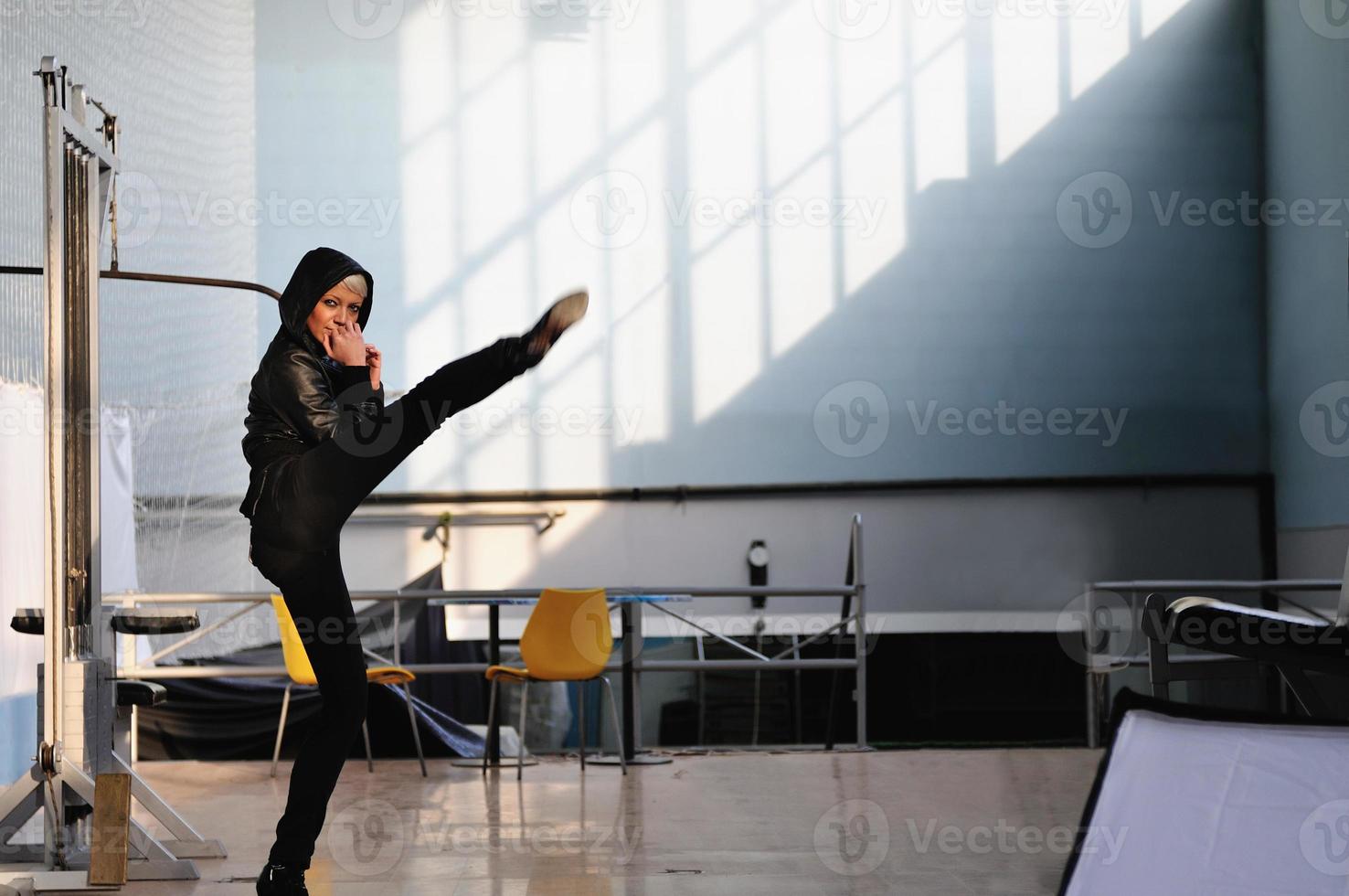 young woman practicing fitness photo