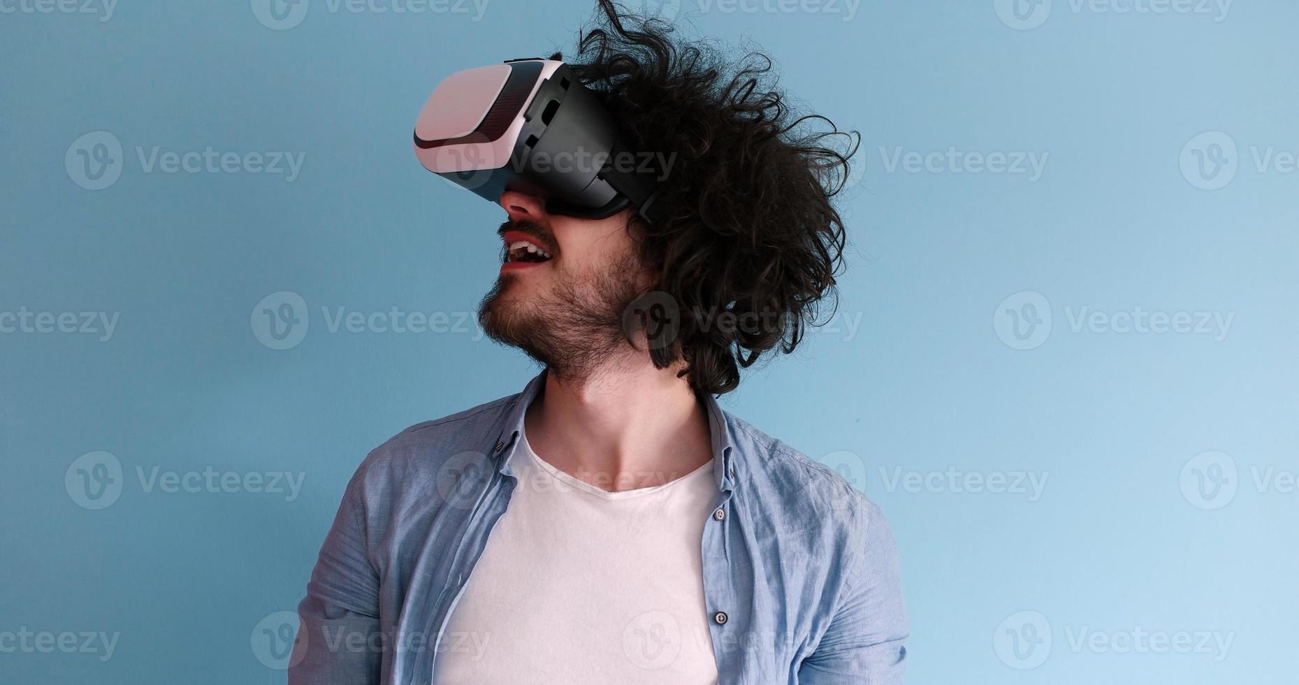 man using VR headset glasses of virtual reality photo