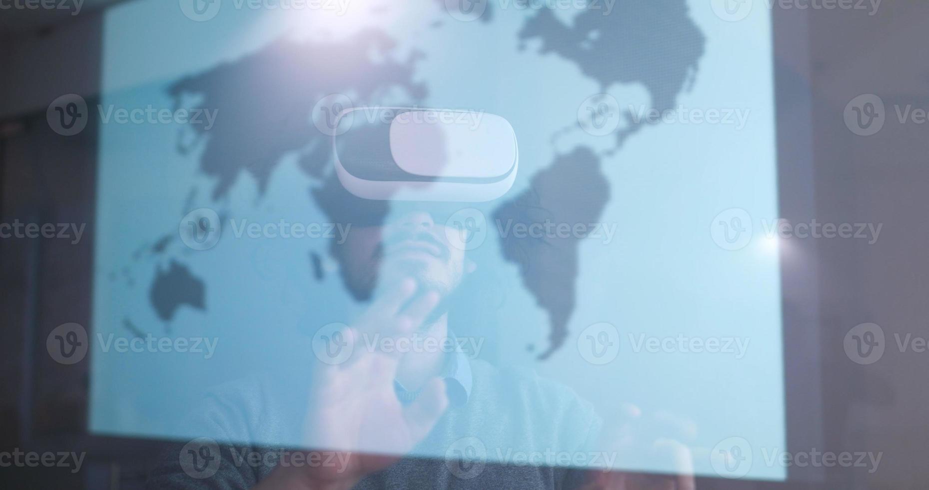 man using VR-headset glasses of virtual reality photo