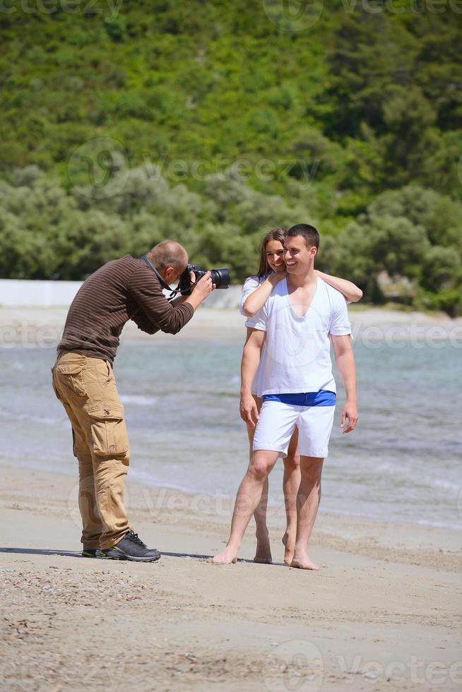 photographer taking photo on beach