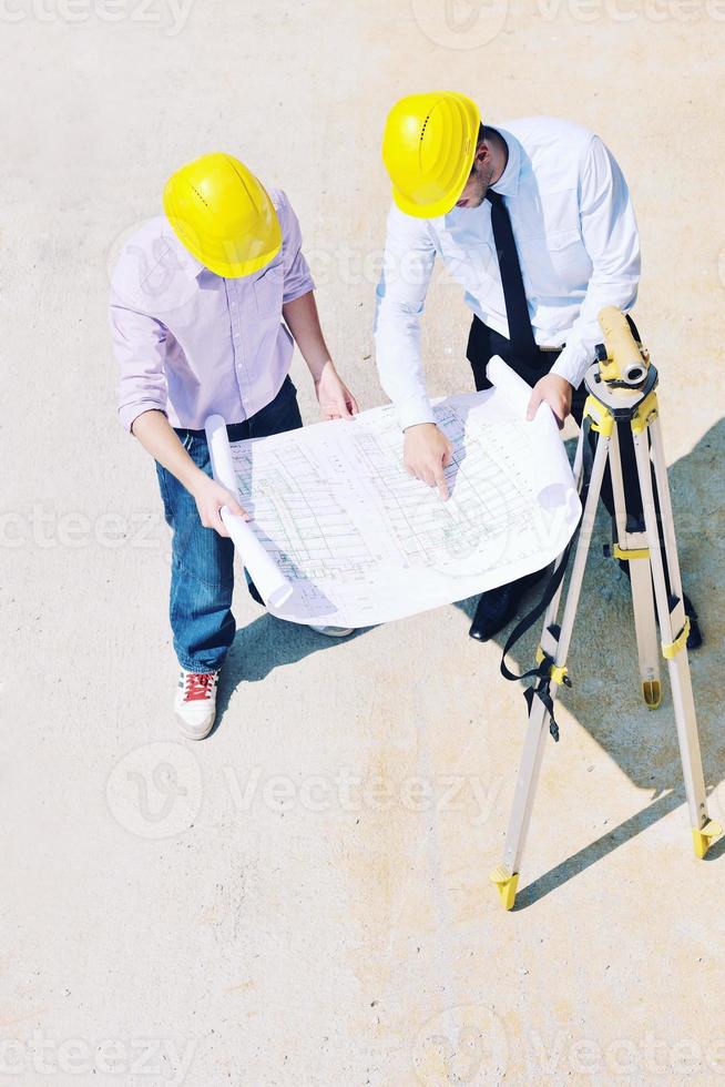 Team of architects on construciton site photo