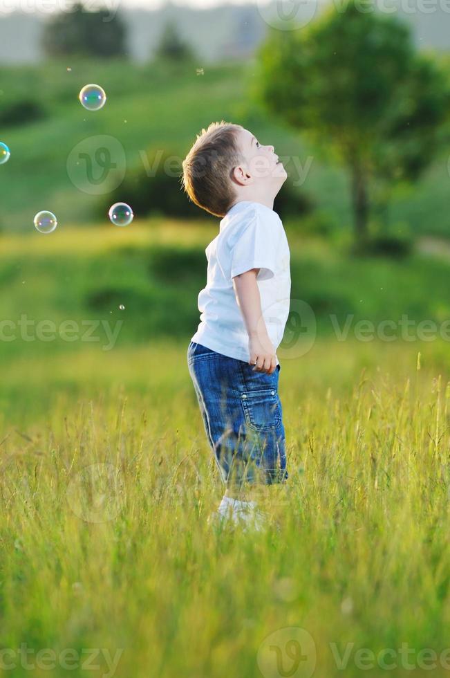 Child and bubbles photo