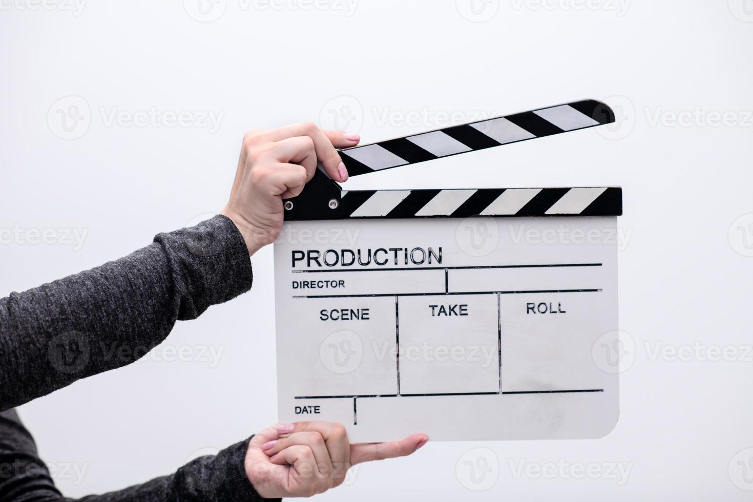 movie clapper on white background photo